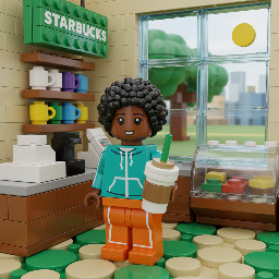 A brown coloured girl with black small  hair drinking latte at starbucks in jogging cloth