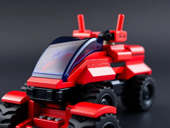 lego spyrius terraine vehicle, red and black color, transparent dark-blue canopies