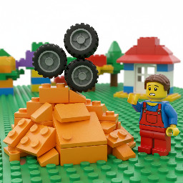 pile of orange pieces and 4 wheels stacked, confused minifigure at the right