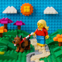 A womam with blond hair And a dog