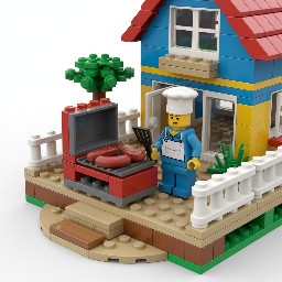 Figurine lego faisant un barbecue  avec viande et saucisses sur la terrasse d'une maison