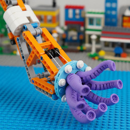 Here is a comprehensive design prompt optimized for generating a hybrid LEGO-3D printed tentacle prosthetic. This prompt integrates specific constraints for medical compliance, weight reduction, and modular interfacing to address the previously identified hurdles.  ### Design Prompt: Hybrid LEGO-Soft Robotic Tentacle Prosthetic  Role: Act as a biomedical engineer and industrial designer specializing in assistive technology and soft robotics.  Task: Generate a detailed technical design specification and assembly guide for a hybrid prosthetic arm that integrates a structural LEGO Technic skeleton with 3D-printed soft tentacle grippers.  Design Constraints & Requirements:  1.  Interface Architecture (The "Hybrid" Joint):     *   Design a custom 3D-printed adapter plate that connects standard LEGO Technic beams (using axle holes or pin interfaces) to the base of the tentacle gripper.     *   The adapter must allow for quick-disconnect functionality (plug-and-twist) to leverage LEGO’s modularity while ensuring the soft gripper base is rigidly locked to prevent torque slippage.     *   *Constraint:* The interface must distribute load evenly to prevent stress concentration on individual LEGO studs.  2.  Soft Gripper Specifications (Medical Compliance):     *   Model 4 to 6 tapered tentacles inspired by octopus arms, designed for compliant grasping of irregular objects.     *   Material: Specify usage of TPU (Thermoplastic Polyurethane) 85A-95A or flexible silicone-like resin to eliminate pressure points and mimic biological tissue compliance.     *   Structure: Incorporate internal pneumatic channels or tendon-routing hollow cores (for cable-driven actuation) within the tentacles.     *   Surface Texture: Include a micro-textured or suction-cup pattern on the inner curvature of the tentacles to enhance grip friction without high clamping force, reducing the risk of dropping objects for users with limited strength.  3.  Weight & Structural Optimization:     *   The LEGO chassis must utilize hollow lattice structures or minimal beam configurations to reduce distal weight.     *   The 3D-printed tentacles must use gyroid or honeycomb infill patterns (10-15% density) to maximize flexibility while minimizing mass, directly addressing the inability to tolerate heavy devices.     *   Total target weight of the end-effector (gripper + adapter) must not exceed 250 grams.  4.  Actuation Mechanism:     *   Design a body-powered cable system compatible with LEGO pulleys and strings, where wrist flexion pulls tendons running through the tentacle cores to induce curling.     *   Alternatively, provide a mount for micro-servo motors housed within the LEGO forearm section for myoelectric control, ensuring wires are routed internally to prevent snagging.  5.  Customization & Accessibility (Socioeconomic Focus):     *   The design must be parametric, allowing the socket interface to be scaled based on simple limb circumference measurements (no professional casting required).     *   Ensure all 3D-printed parts are support-free or use soluble supports to allow printing on low-cost, single-extruder printers common in developing regions.     *   Provide a Bill of Materials (BOM) that prioritizes globally available LEGO Technic elements and standard fishing line (Spectra/Dyneema) for tendons.